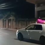 Mulher é flagrada andando no teto do carro do pai no Barreiro, em BH - Foto: Reprodução/@wendel_2.4.4__