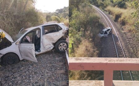 CARRO CAPOTA CAI SOBRE LINHA FERREA